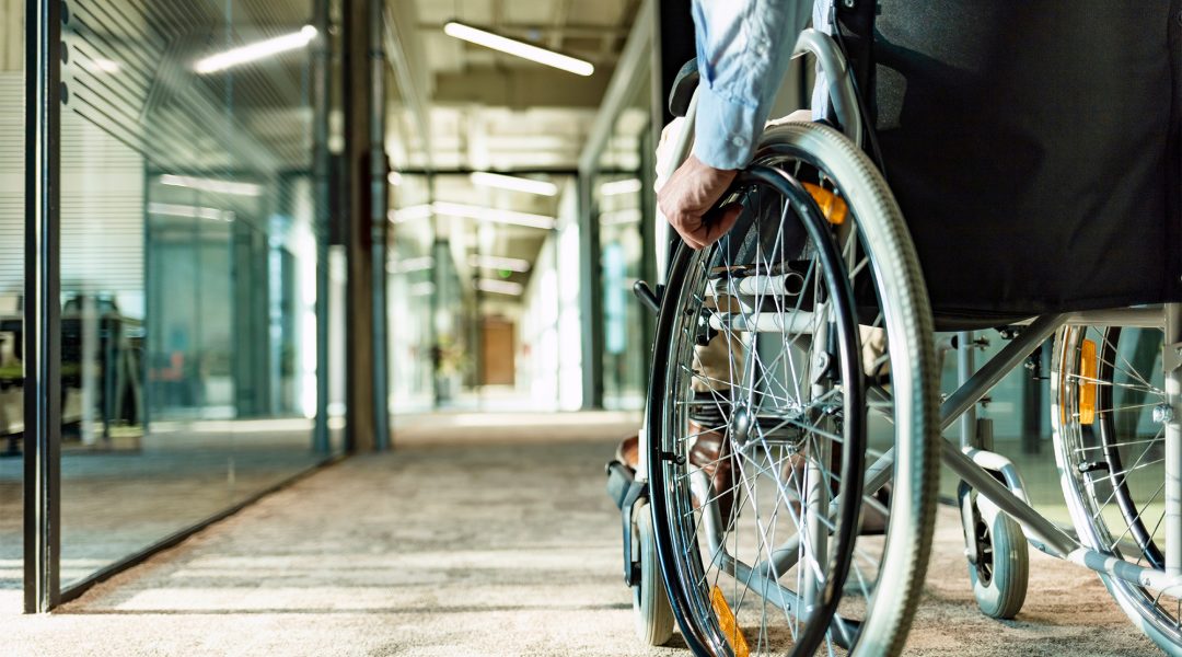 Close up of wheelchair in modern office space